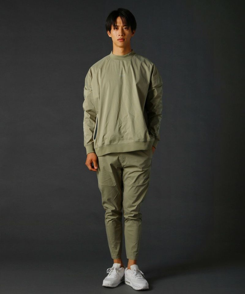 撥水ストレッチ布帛止水ジップハイネック長袖プルオーバー | REZES