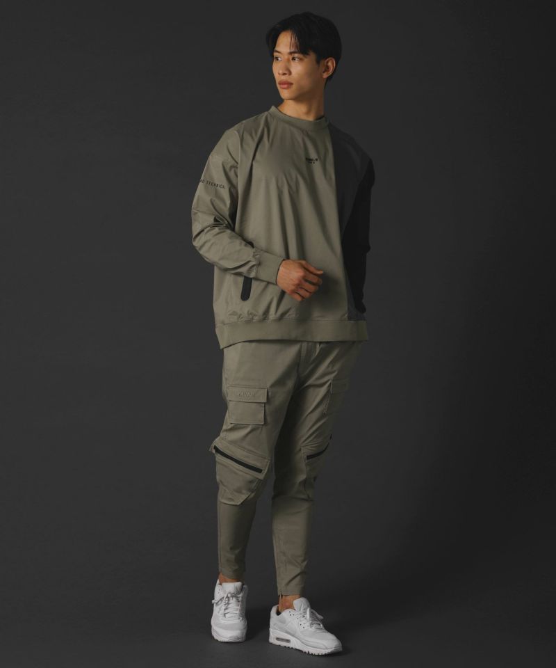 ベルトループ付き撥水加工ストレッチ布帛ダブルカーゴポケット裾ジップ