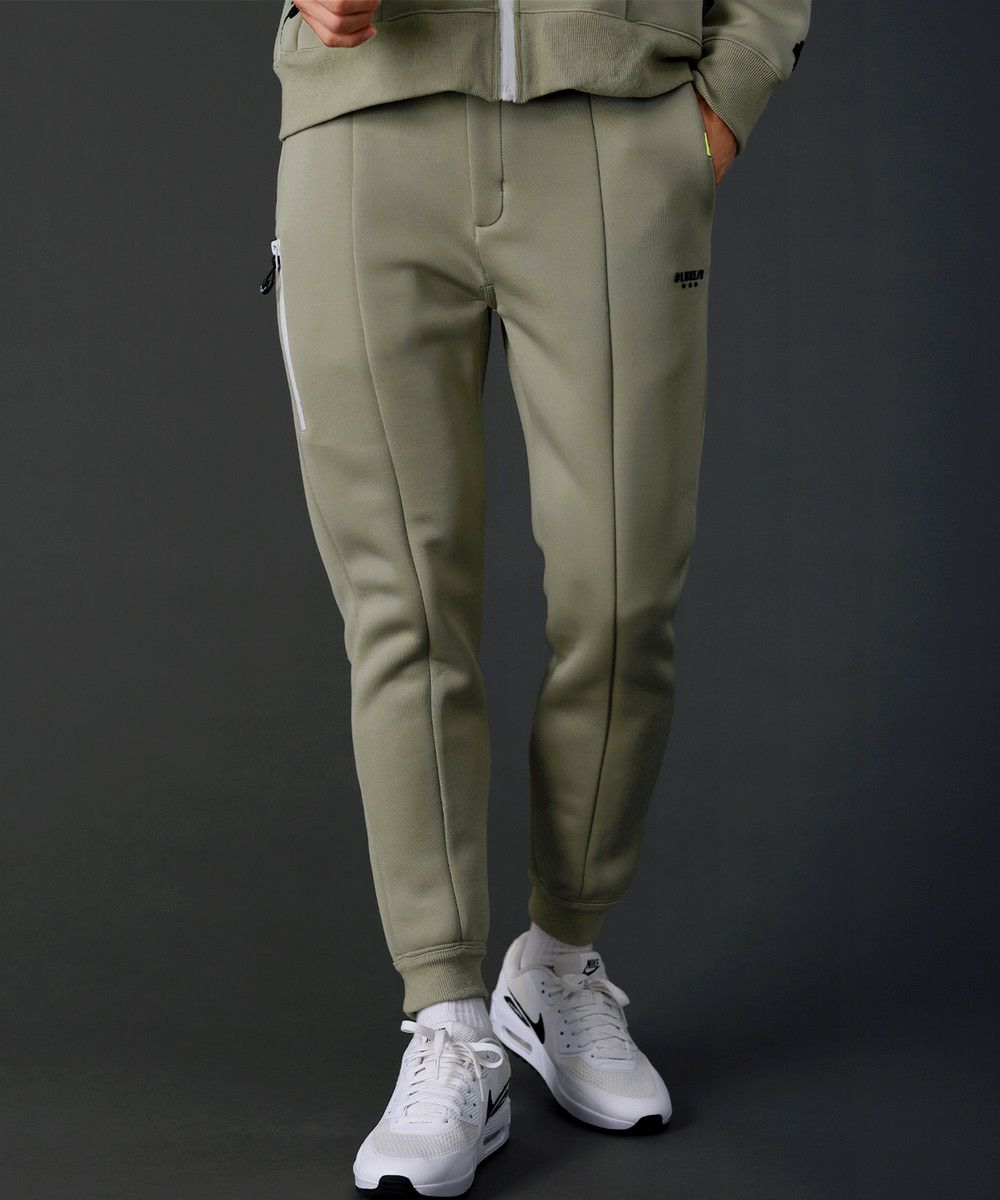 ベルトループ付き止水ジップスポンジボンディング裾ジップパンツ