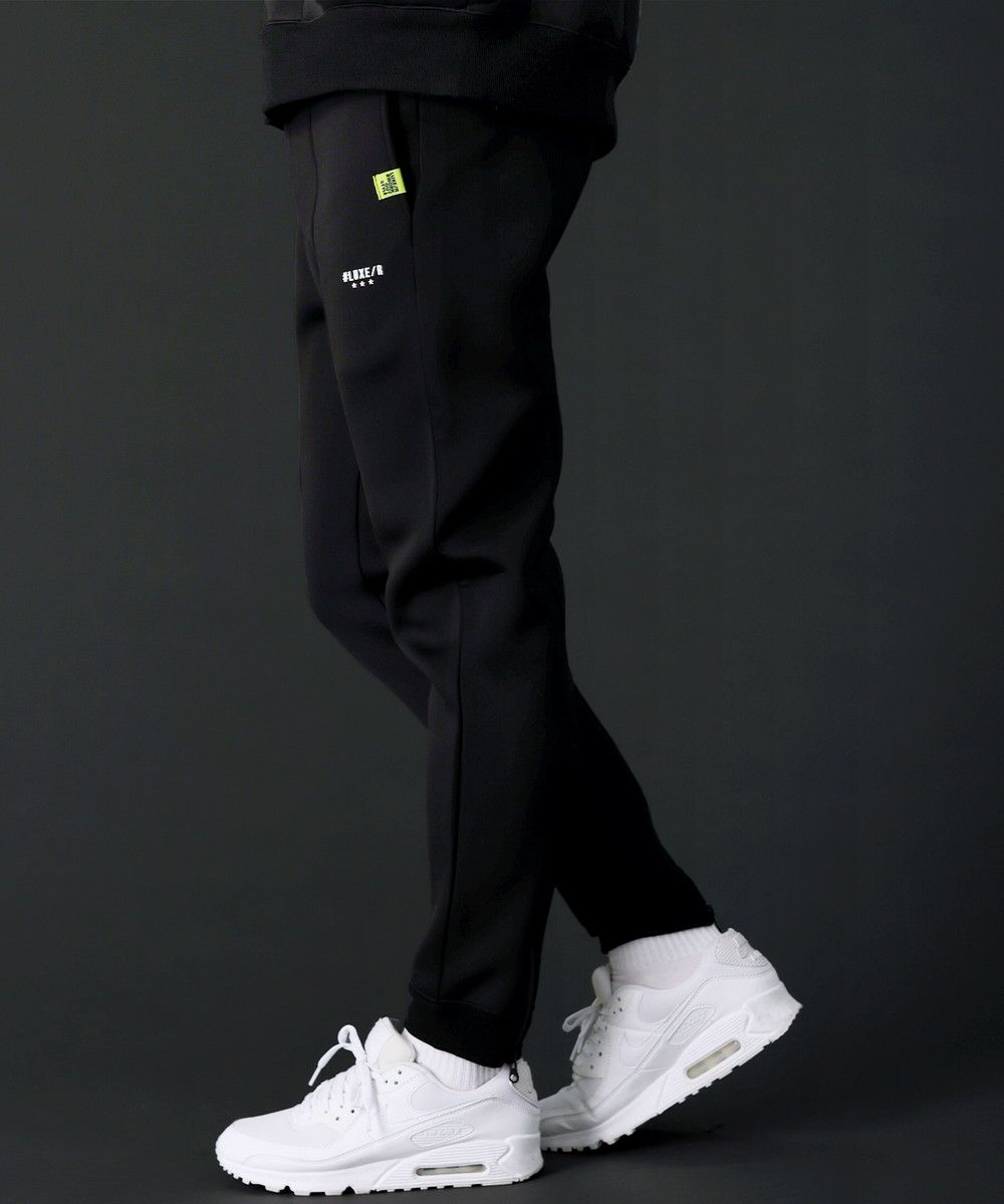 ベルトループ付き止水ジップスポンジボンディング裾ジップパンツ